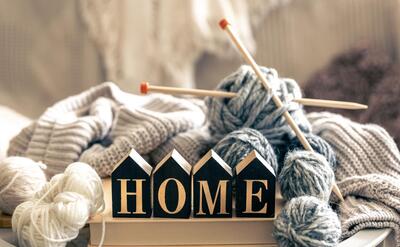 Cozy home composition with threads for knitting